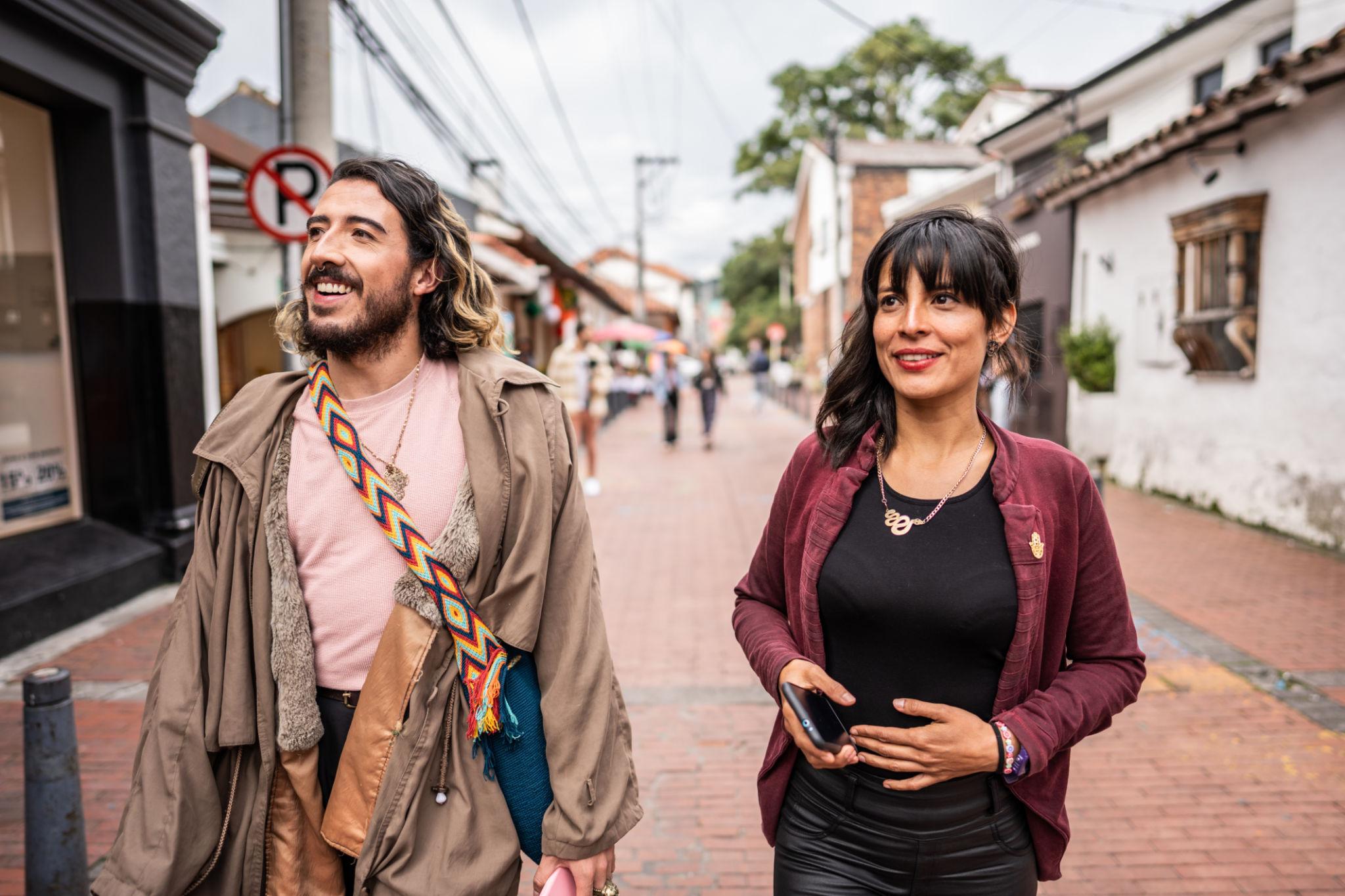 John and a traveler exploring Bogotá together